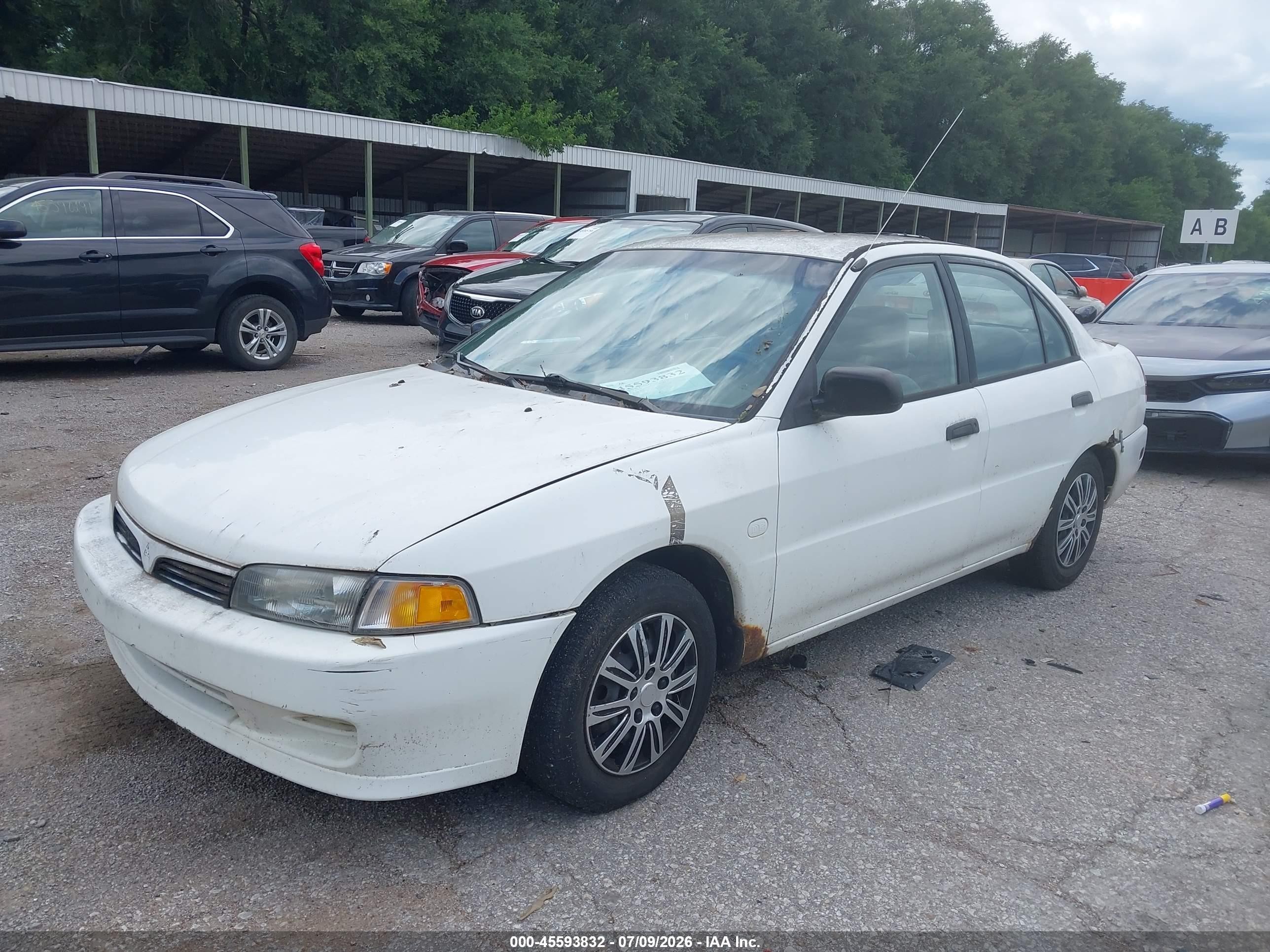 2000 Mitsubishi Mirage De White vin: JA3AY26C0YU029415