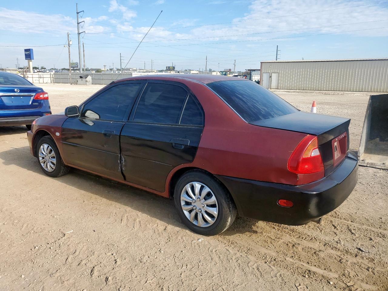 2000 Mitsubishi Mirage De Burgundy vin: JA3AY26C0YU033500
