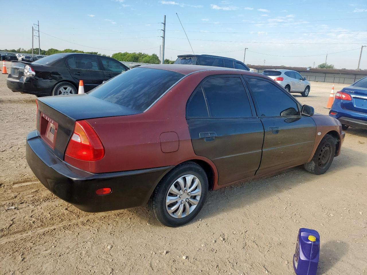 2000 Mitsubishi Mirage De Burgundy vin: JA3AY26C0YU033500