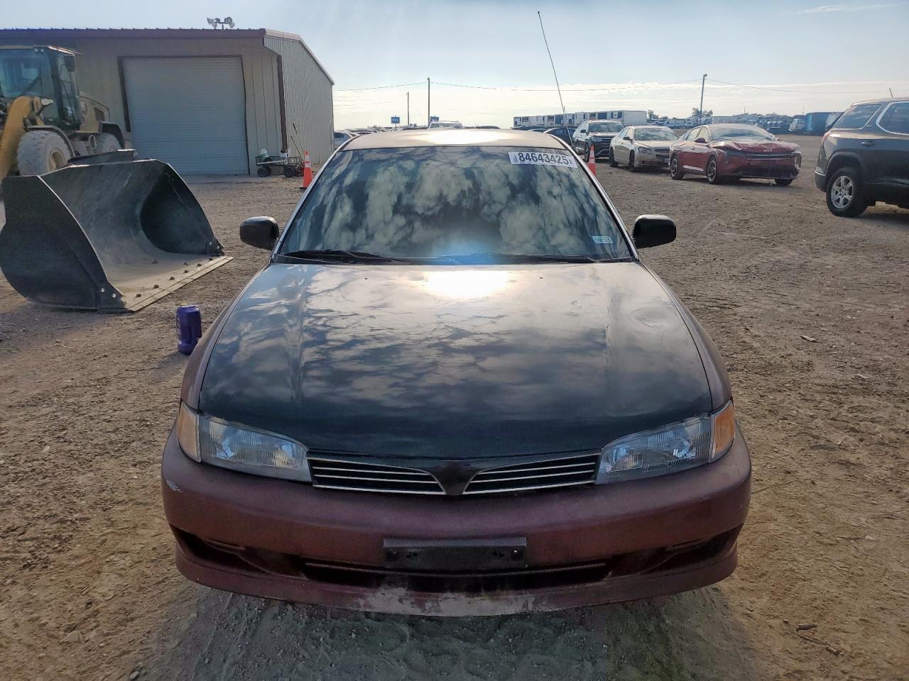 2000 Mitsubishi Mirage De Burgundy vin: JA3AY26C0YU033500