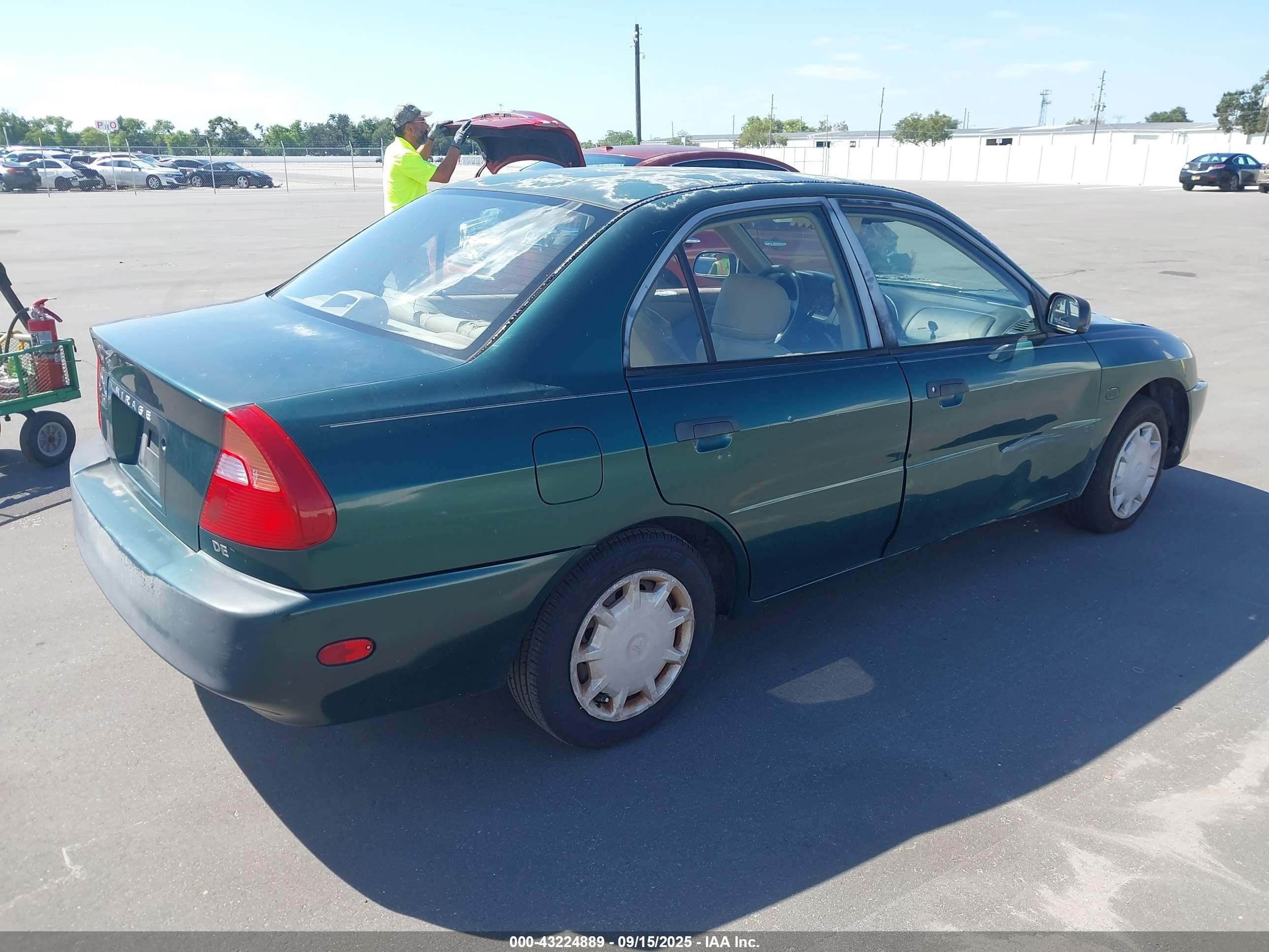 2000 Mitsubishi Mirage De Green vin: JA3AY26C1YU012087