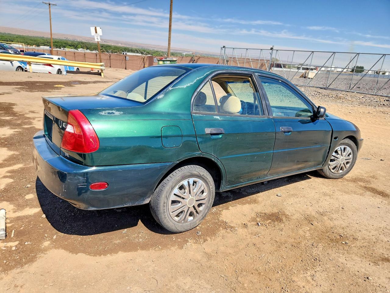 2000 Mitsubishi Mirage De Green vin: JA3AY26C2YU008193