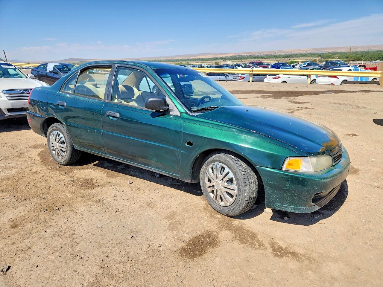 2000 Mitsubishi Mirage De Green vin: JA3AY26C2YU008193