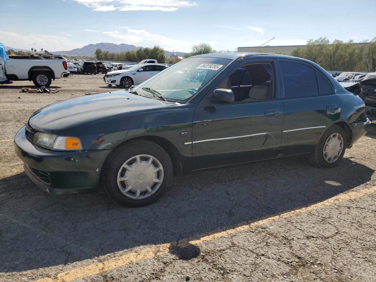 2000 Mitsubishi Mirage De Green vin: JA3AY26C2YU050010