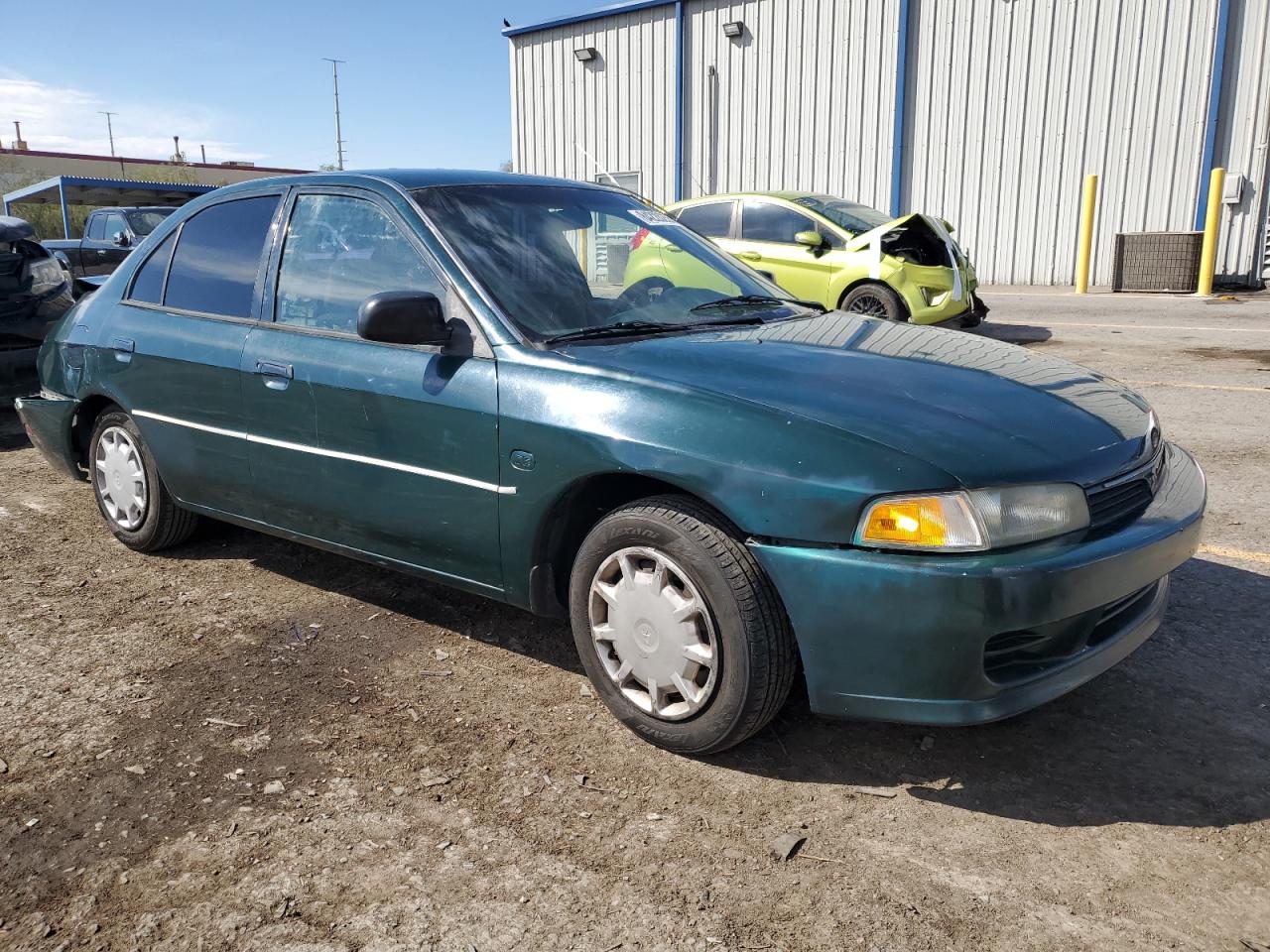 2000 Mitsubishi Mirage De Green vin: JA3AY26C2YU050010