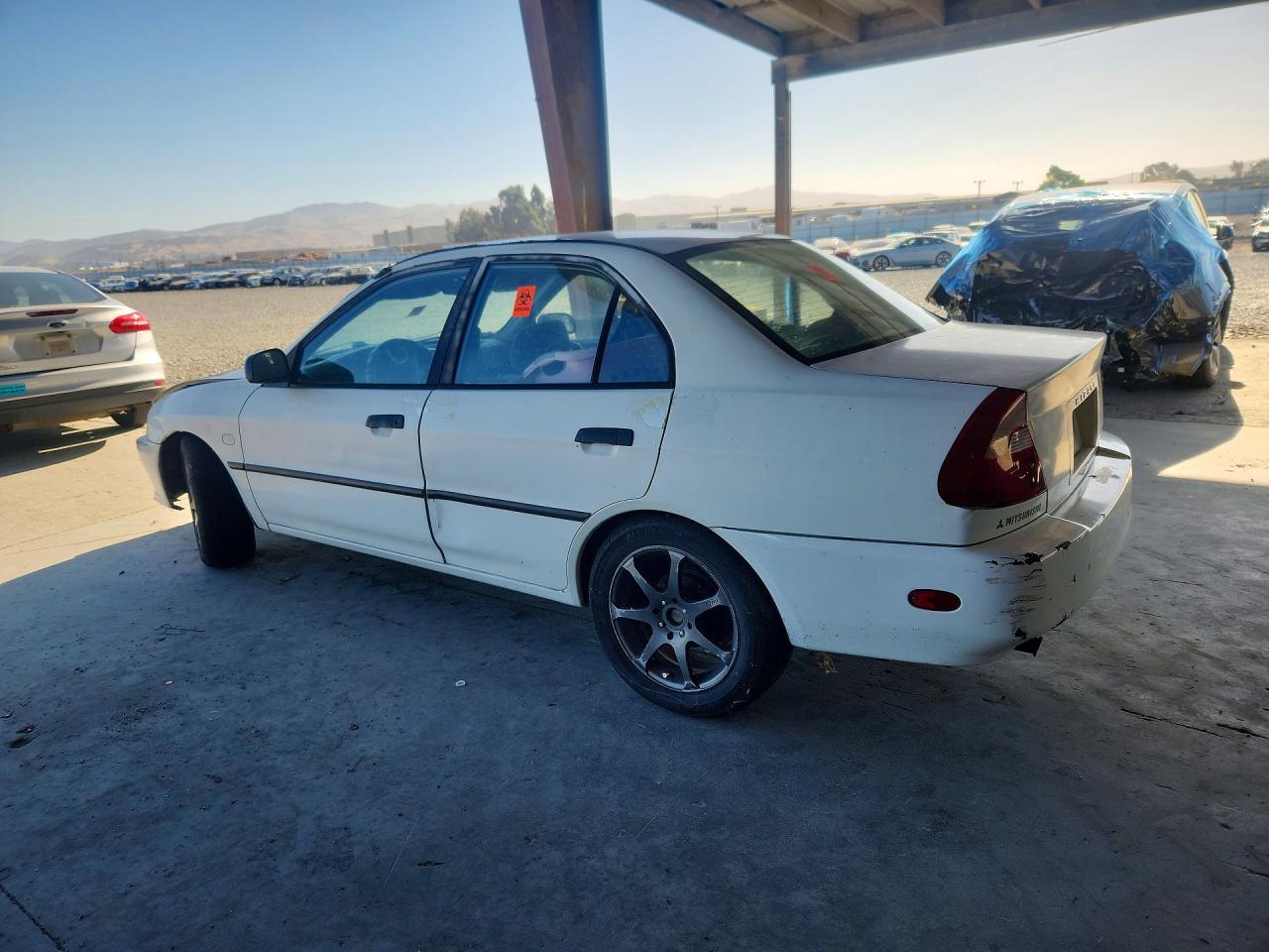 2000 Mitsubishi Mirage De White vin: JA3AY26C2YU058558