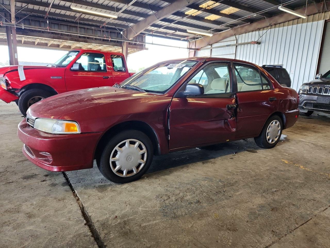 2000 Mitsubishi Mirage De Red vin: JA3AY26C3YU031708