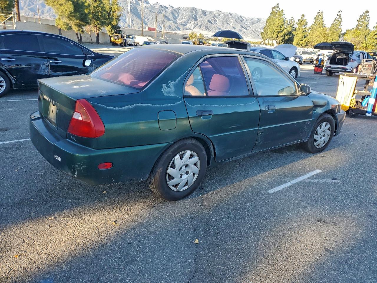 2000 Mitsubishi Mirage De Green vin: JA3AY26C3YU055975