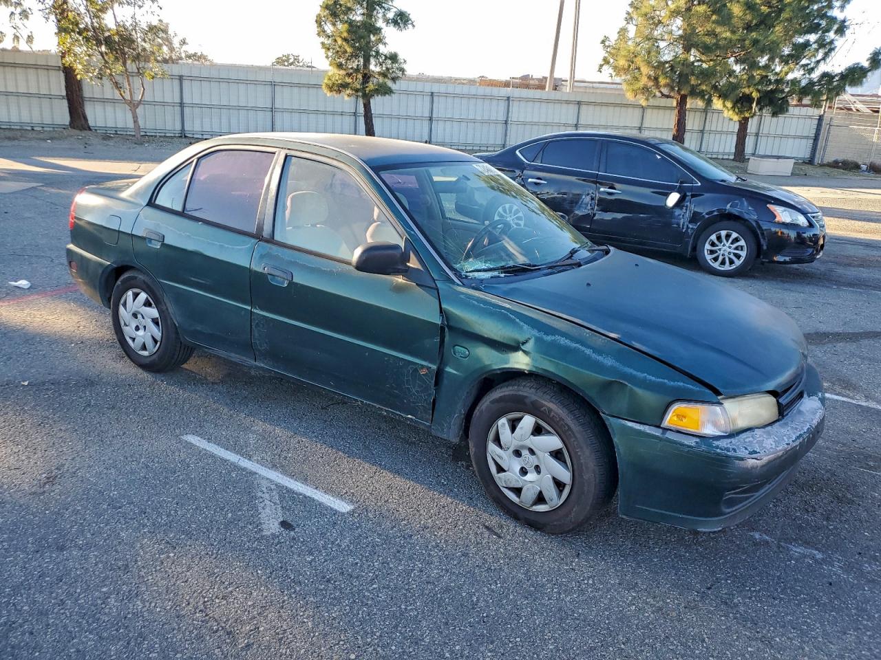 2000 Mitsubishi Mirage De Green vin: JA3AY26C3YU055975