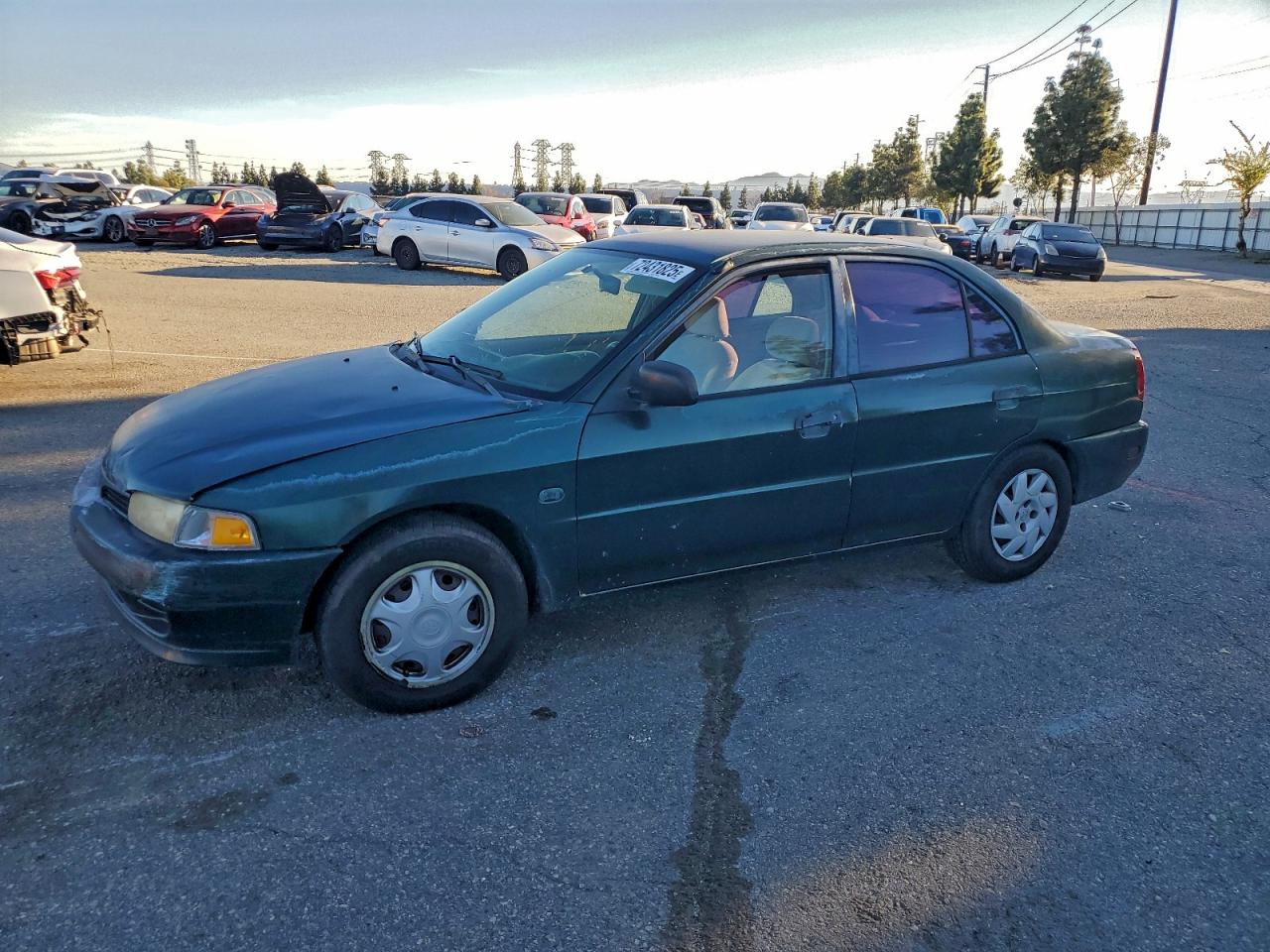 2000 Mitsubishi Mirage De Green vin: JA3AY26C3YU055975