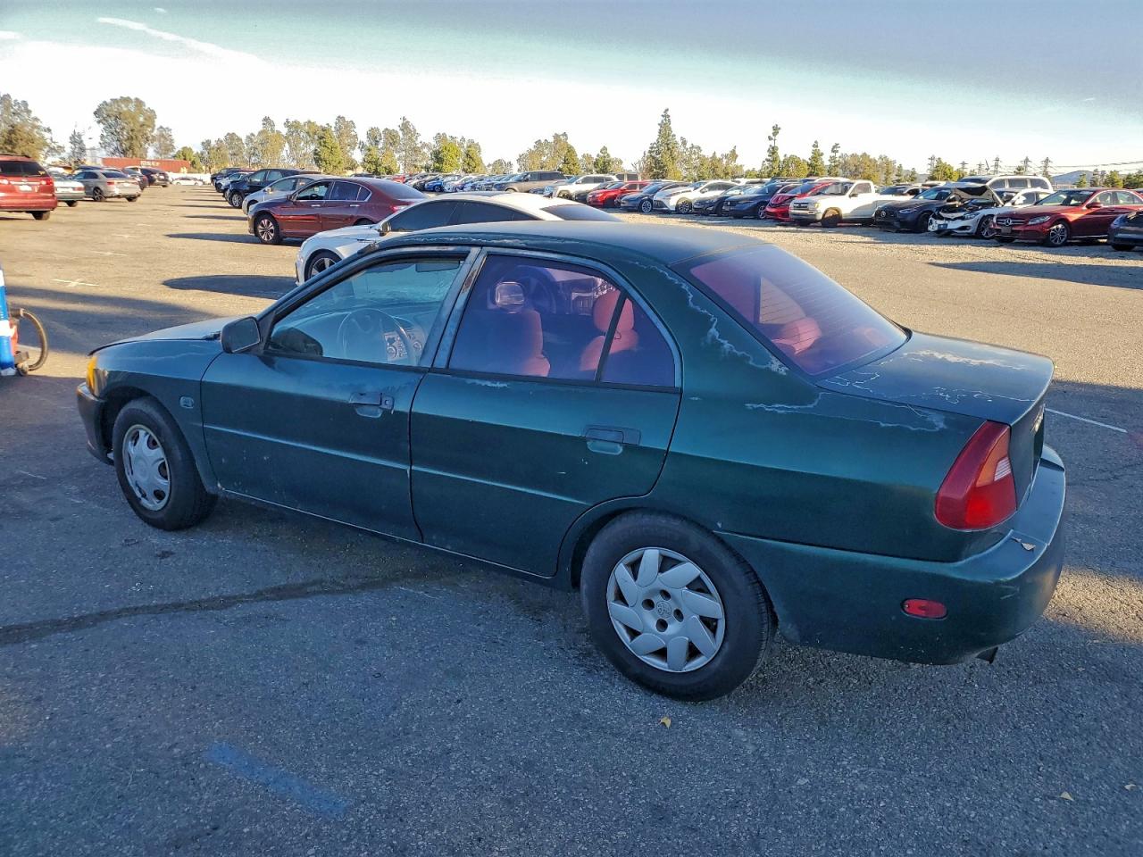 2000 Mitsubishi Mirage De Green vin: JA3AY26C3YU055975