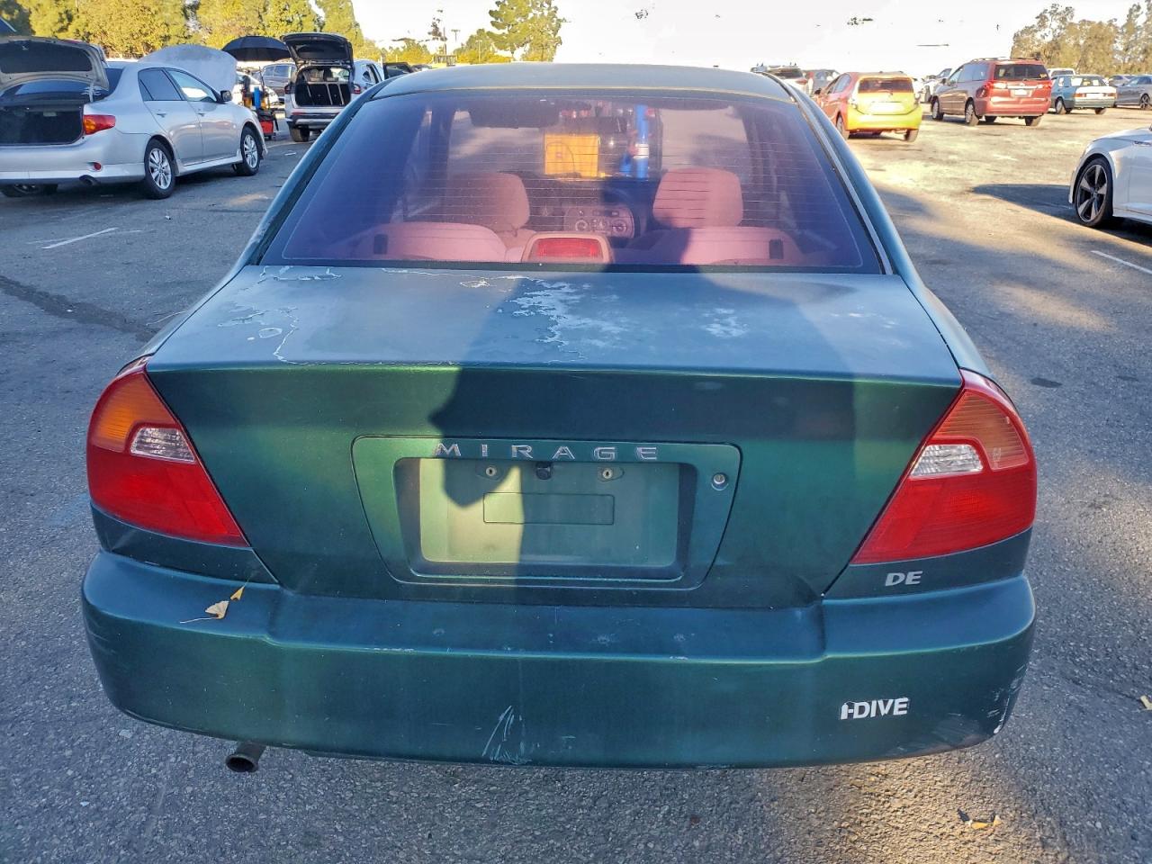 2000 Mitsubishi Mirage De Green vin: JA3AY26C3YU055975