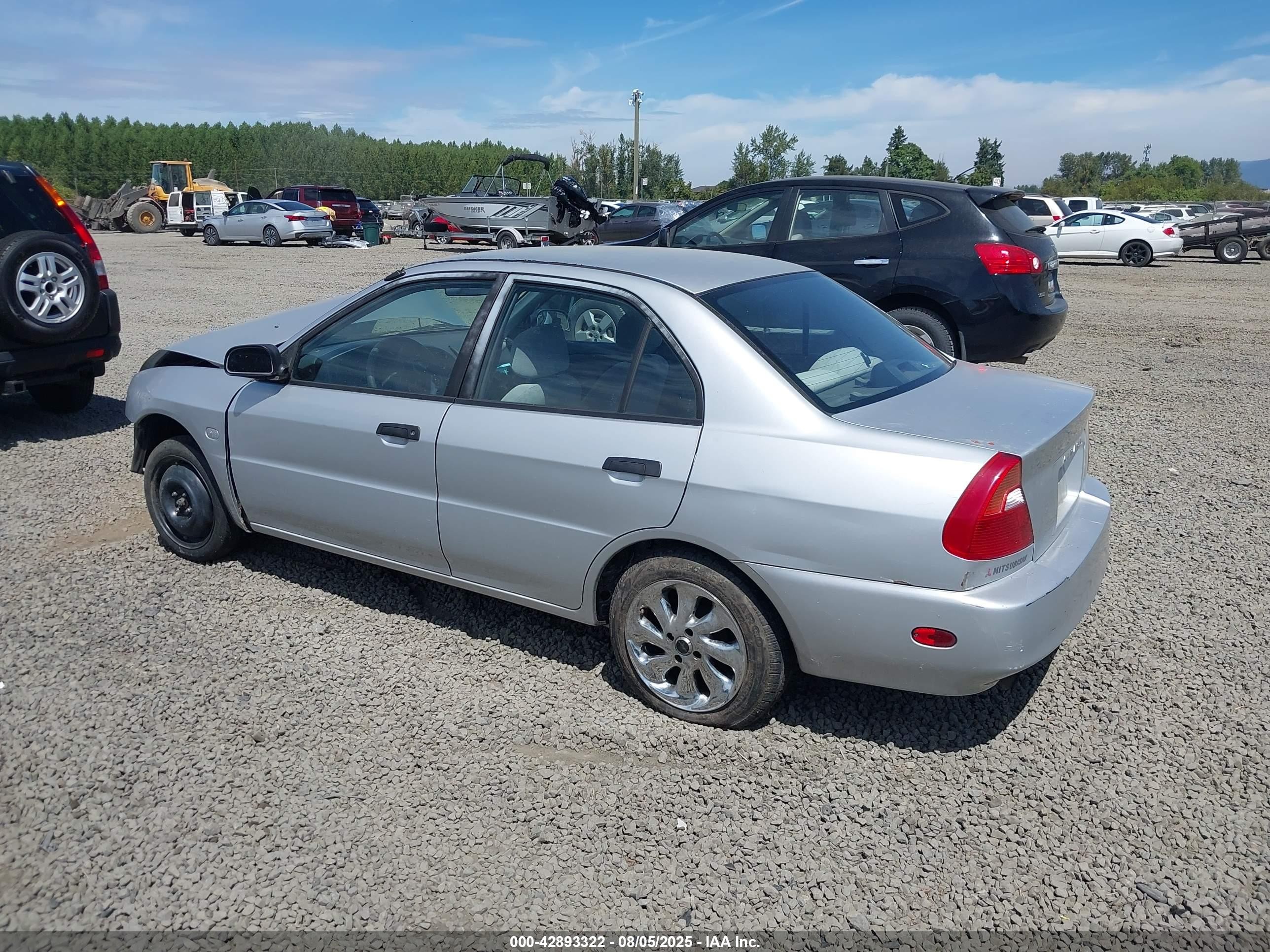 2000 Mitsubishi Mirage De Silver vin: JA3AY26C4YU060327