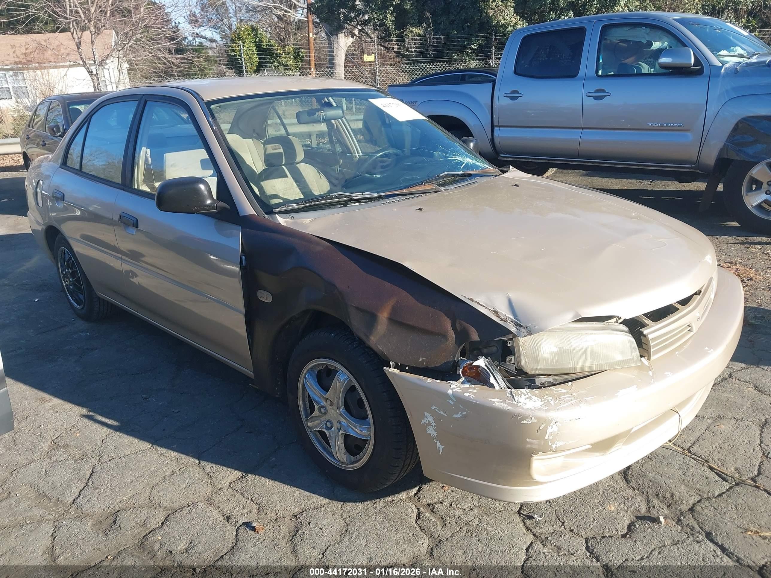 2000 Mitsubishi Mirage De Gold vin: JA3AY26C6YU011226