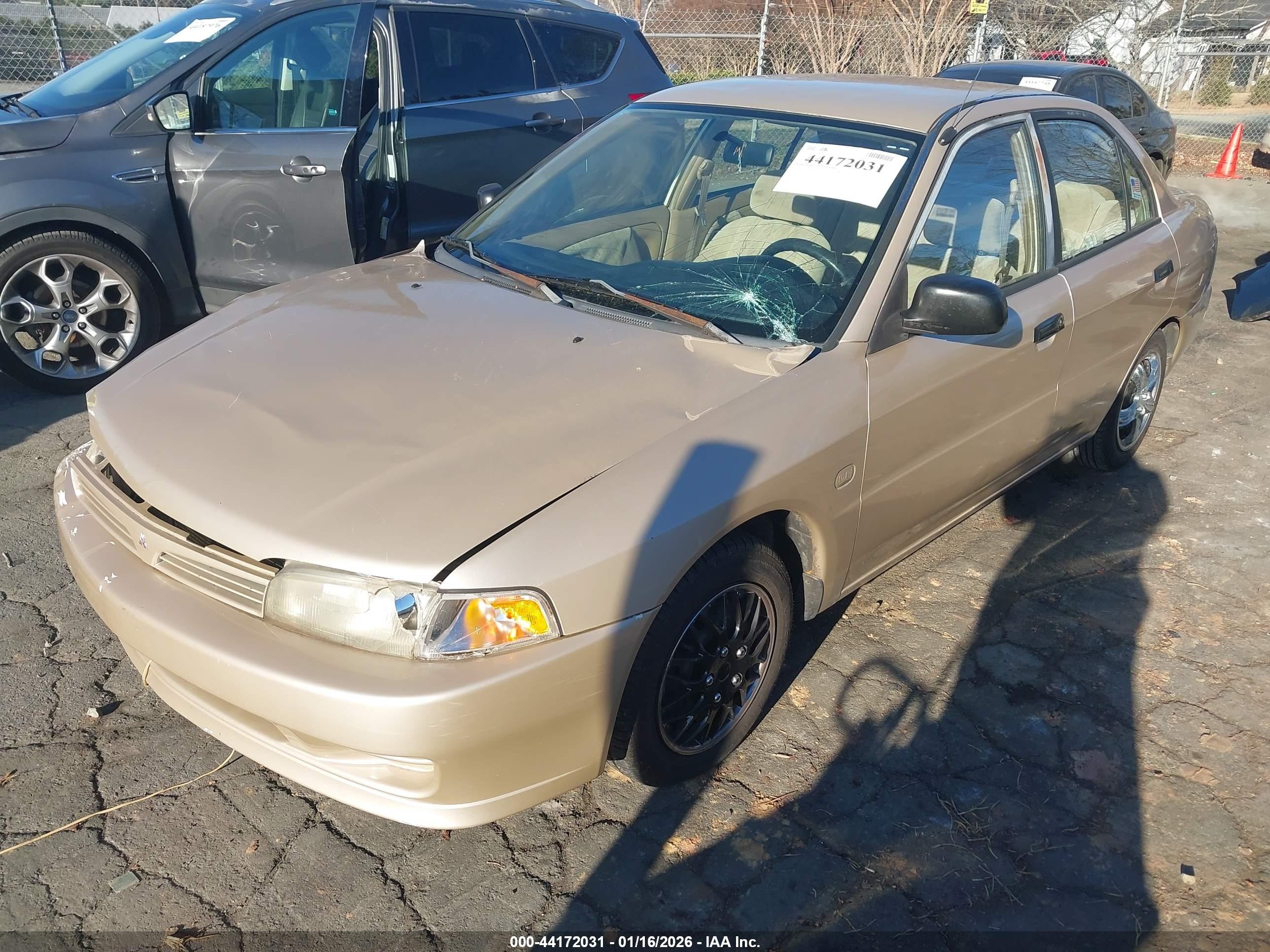 2000 Mitsubishi Mirage De Gold vin: JA3AY26C6YU011226