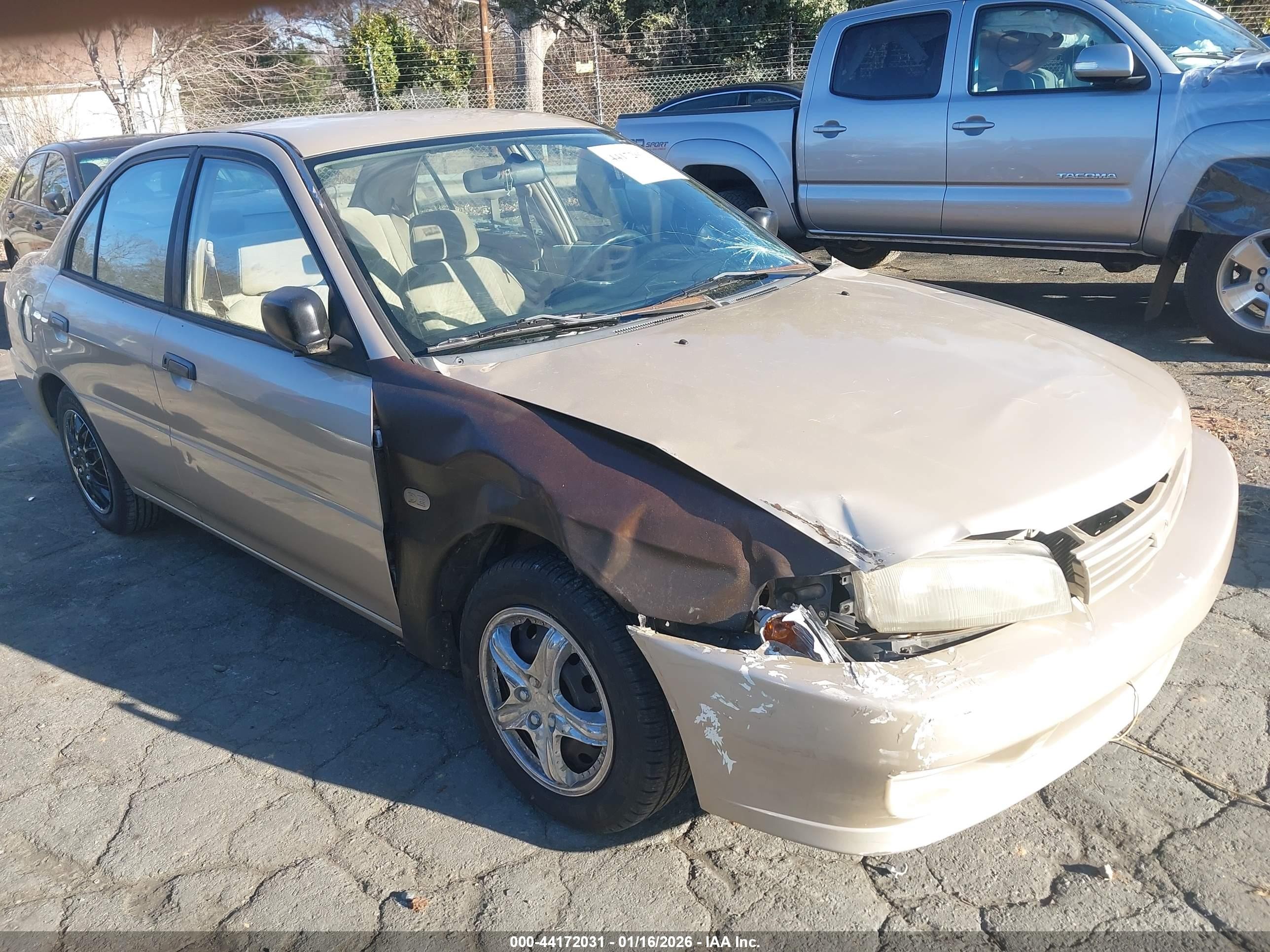 2000 Mitsubishi Mirage De Gold vin: JA3AY26C6YU011226