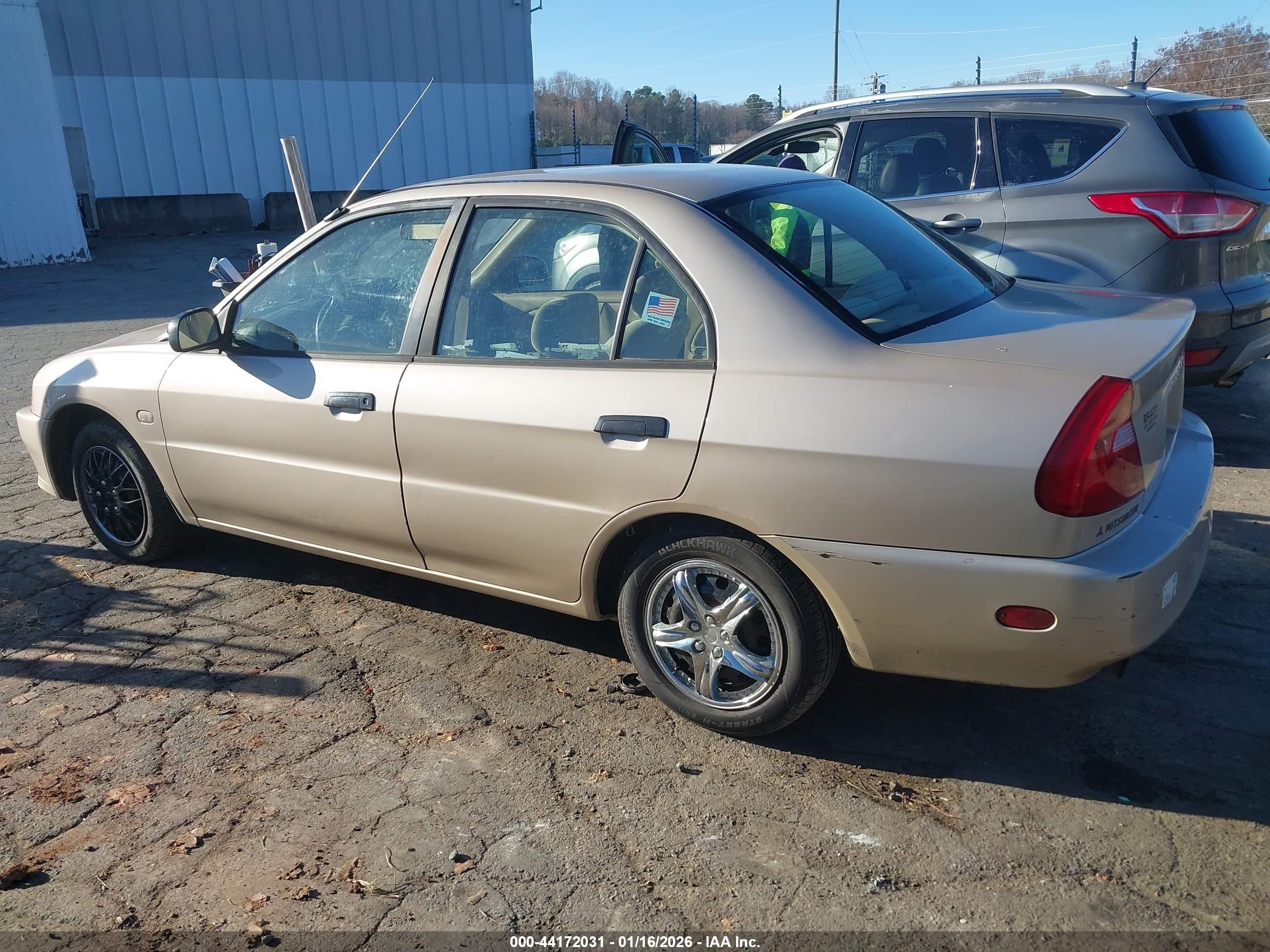 2000 Mitsubishi Mirage De Gold vin: JA3AY26C6YU011226