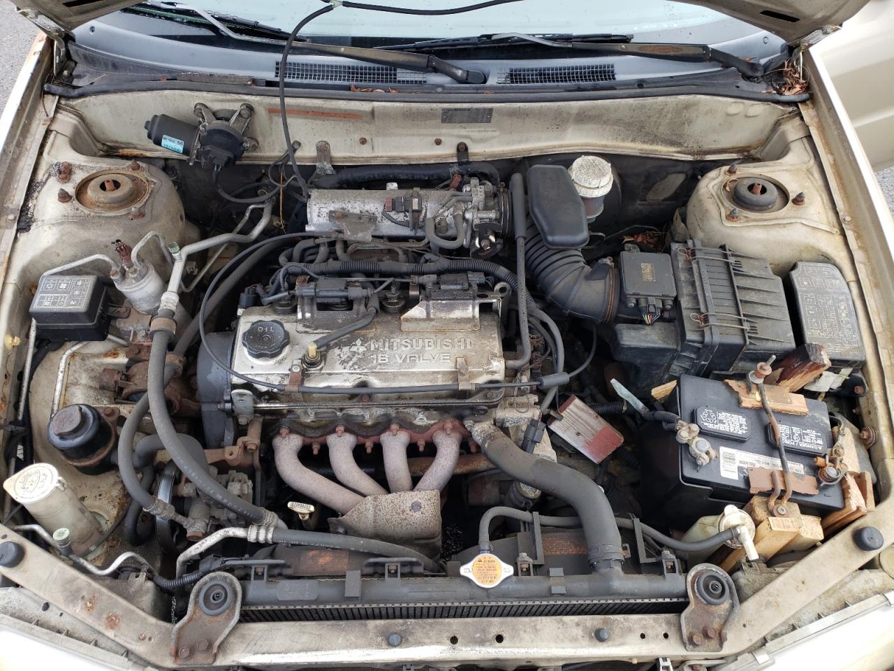 2000 Mitsubishi Mirage De Tan vin: JA3AY26C8YU036516