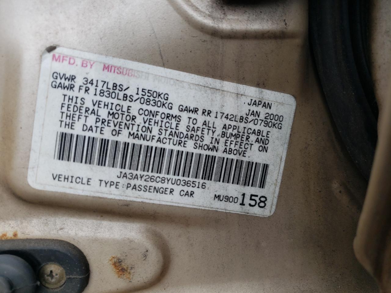 2000 Mitsubishi Mirage De Tan vin: JA3AY26C8YU036516