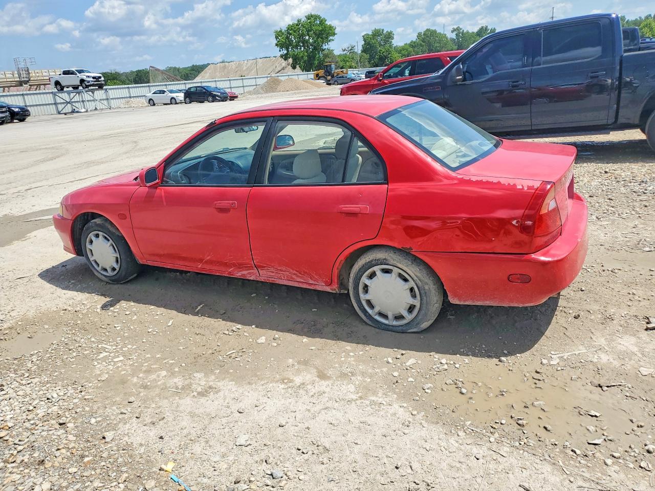 2000 Mitsubishi Mirage Red vin: JA3AY26C9YU031888