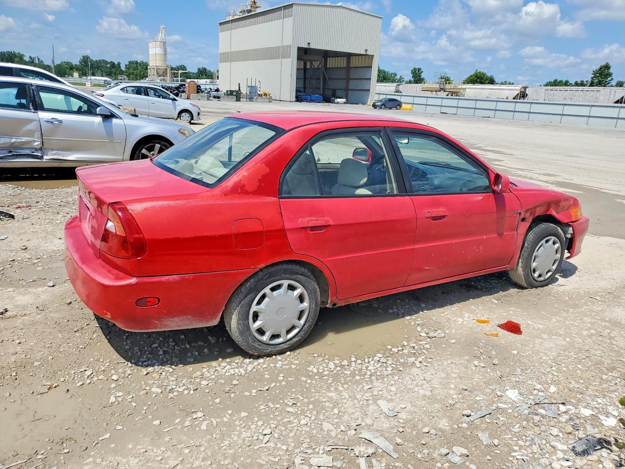 2000 Mitsubishi Mirage Red vin: JA3AY26C9YU031888