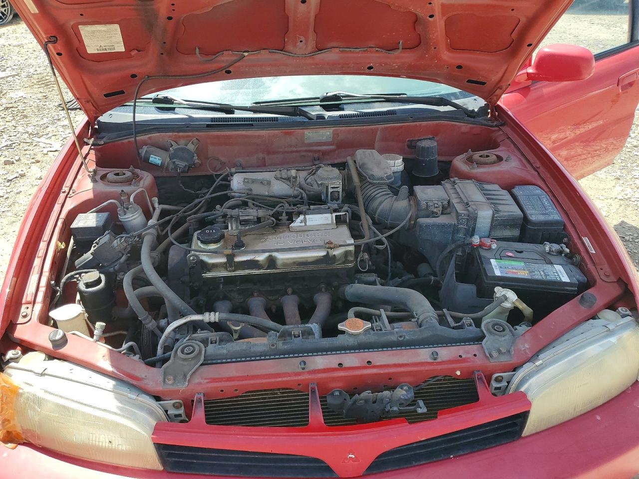 2000 Mitsubishi Mirage Red vin: JA3AY26C9YU031888