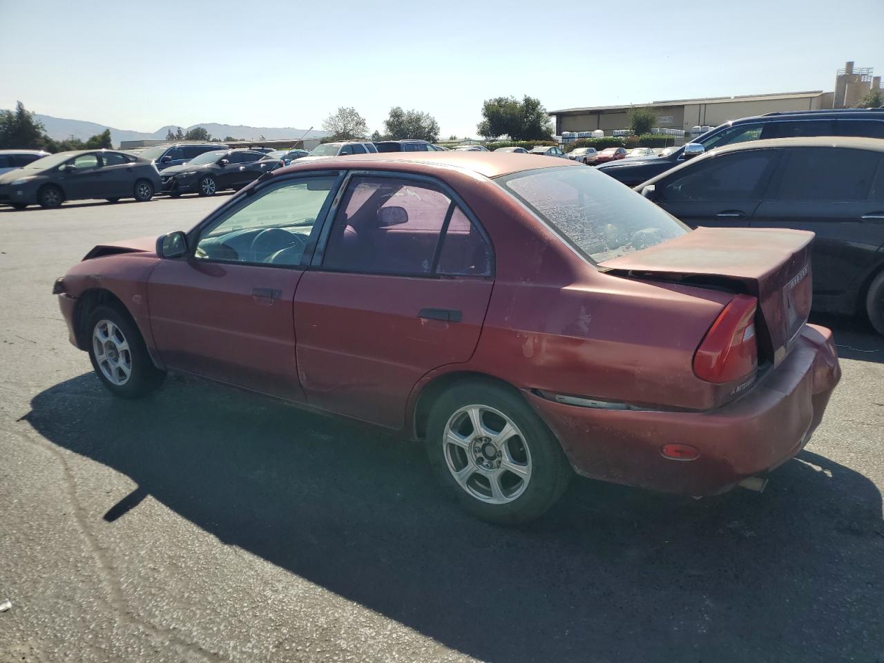 2000 Mitsubishi Mirage De Red vin: JA3AY26CXYU016316