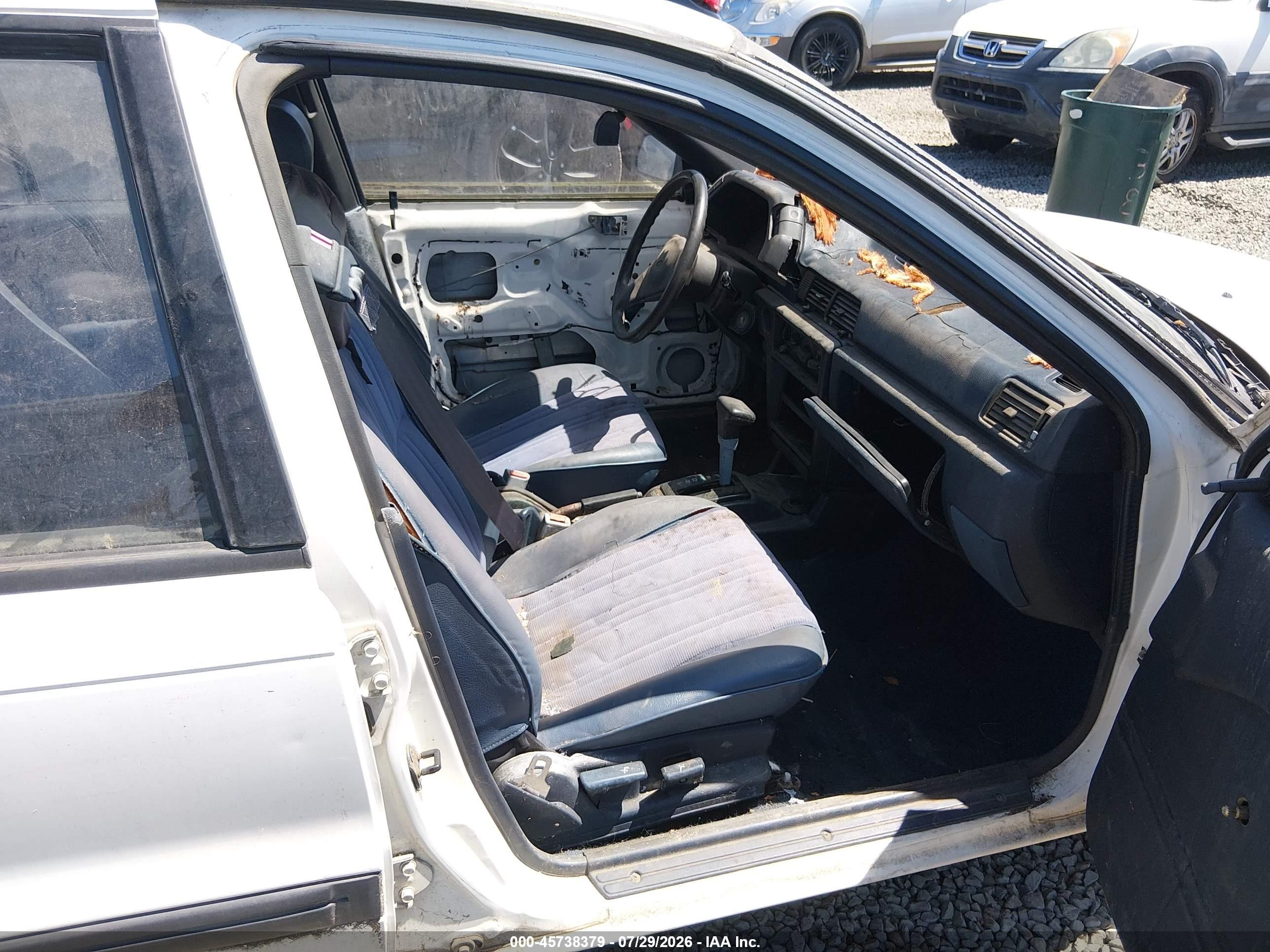 1990 Mitsubishi Mirage   White vin: JA3CU26XXLU031415