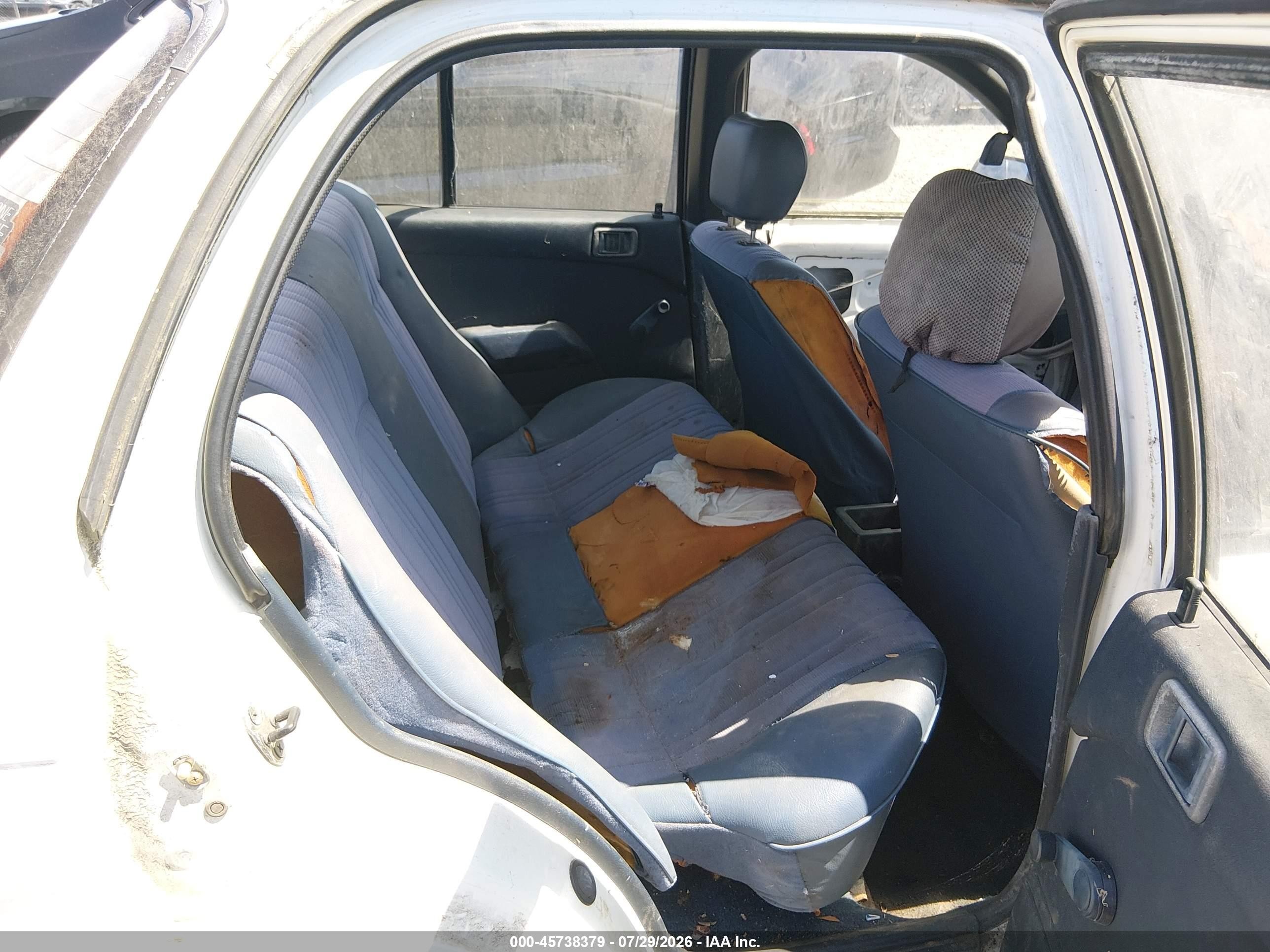 1990 Mitsubishi Mirage   White vin: JA3CU26XXLU031415