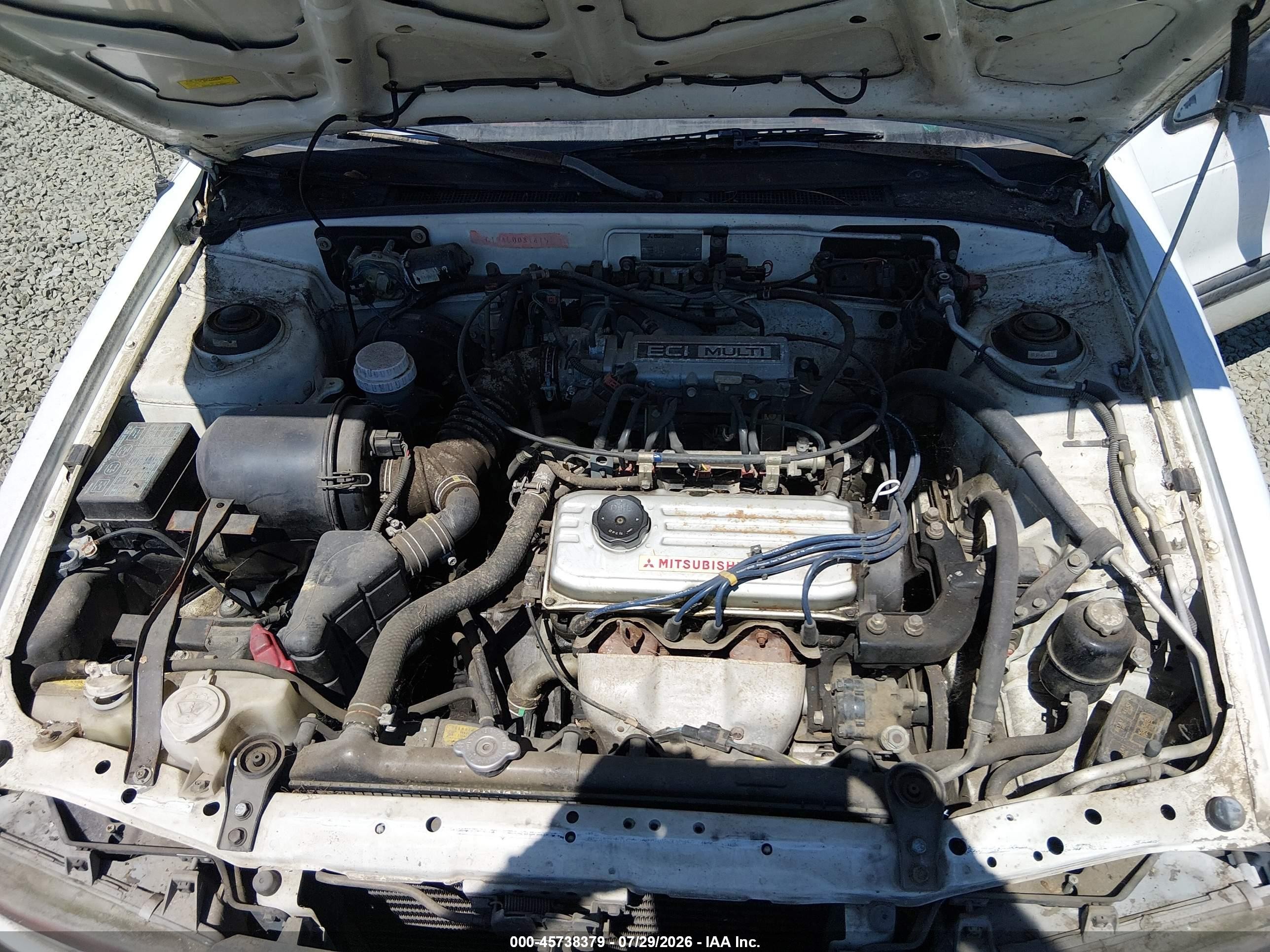 1990 Mitsubishi Mirage   White vin: JA3CU26XXLU031415