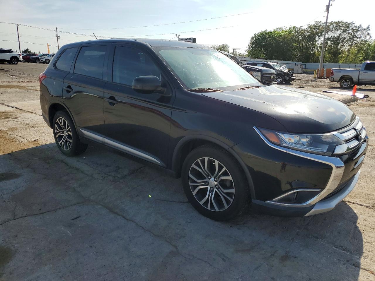 2016 Mitsubishi Outlander Es Черный vin: JA4AD2A36GZ045490