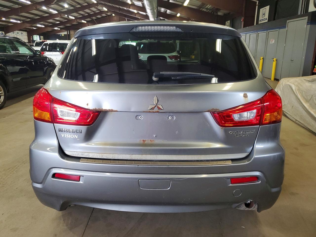 2012 Mitsubishi Outlander Sport Es Silver vin: JA4AP3AU0CZ002375