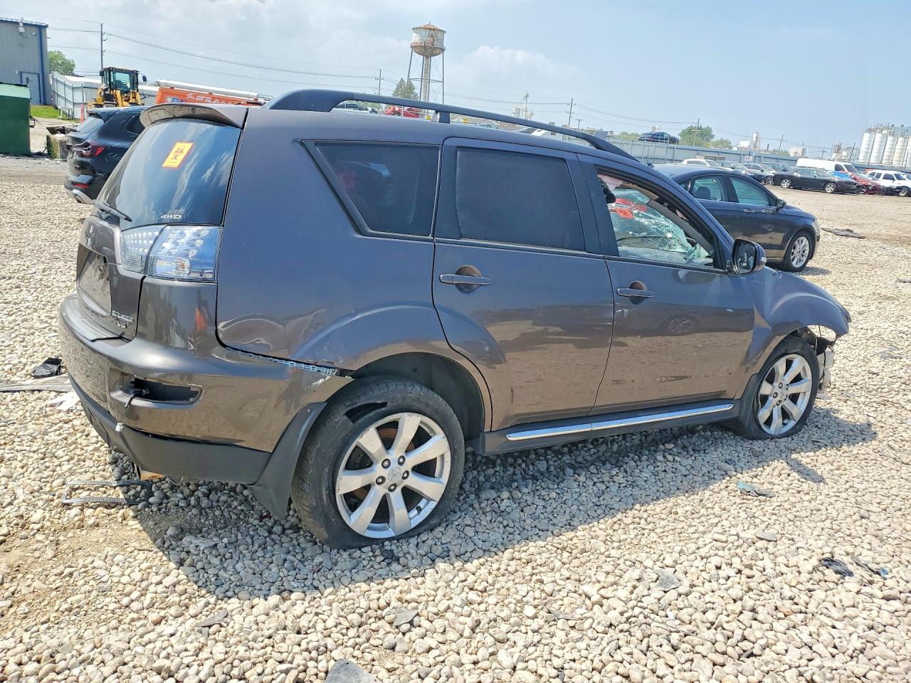 2010 Mitsubishi Outlander Xls Tan vin: JA4JT4AX0AZ002949