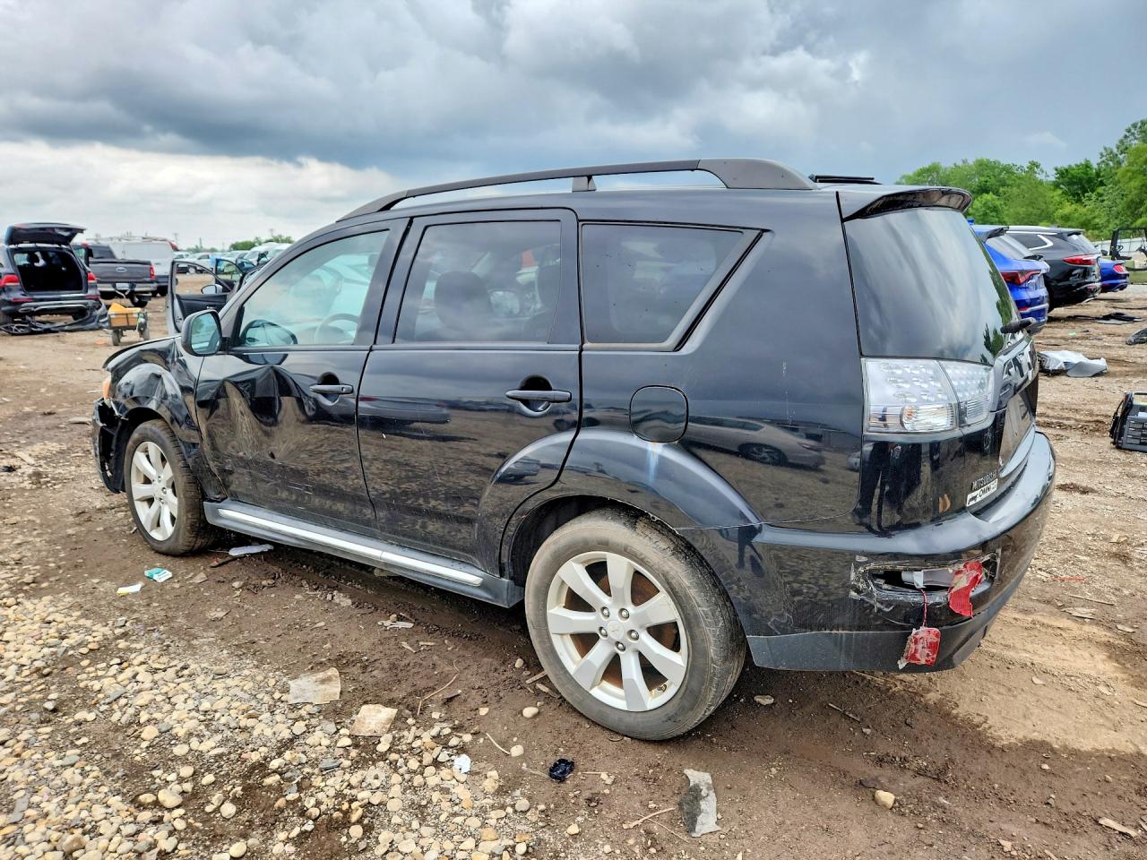 2010 Mitsubishi Outlander Xls Black vin: JA4JT4AX9AZ002657