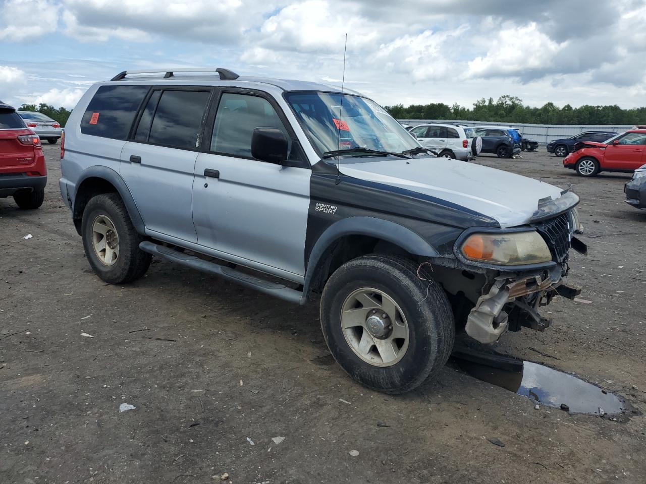 2004 Mitsubishi Montero Sport Es   Серебряный vin: JA4LS21R74J004265