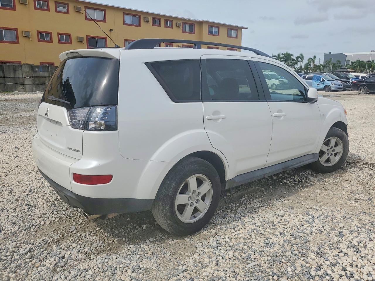2009 Mitsubishi Outlander Es White vin: JA4LS21W49Z011186