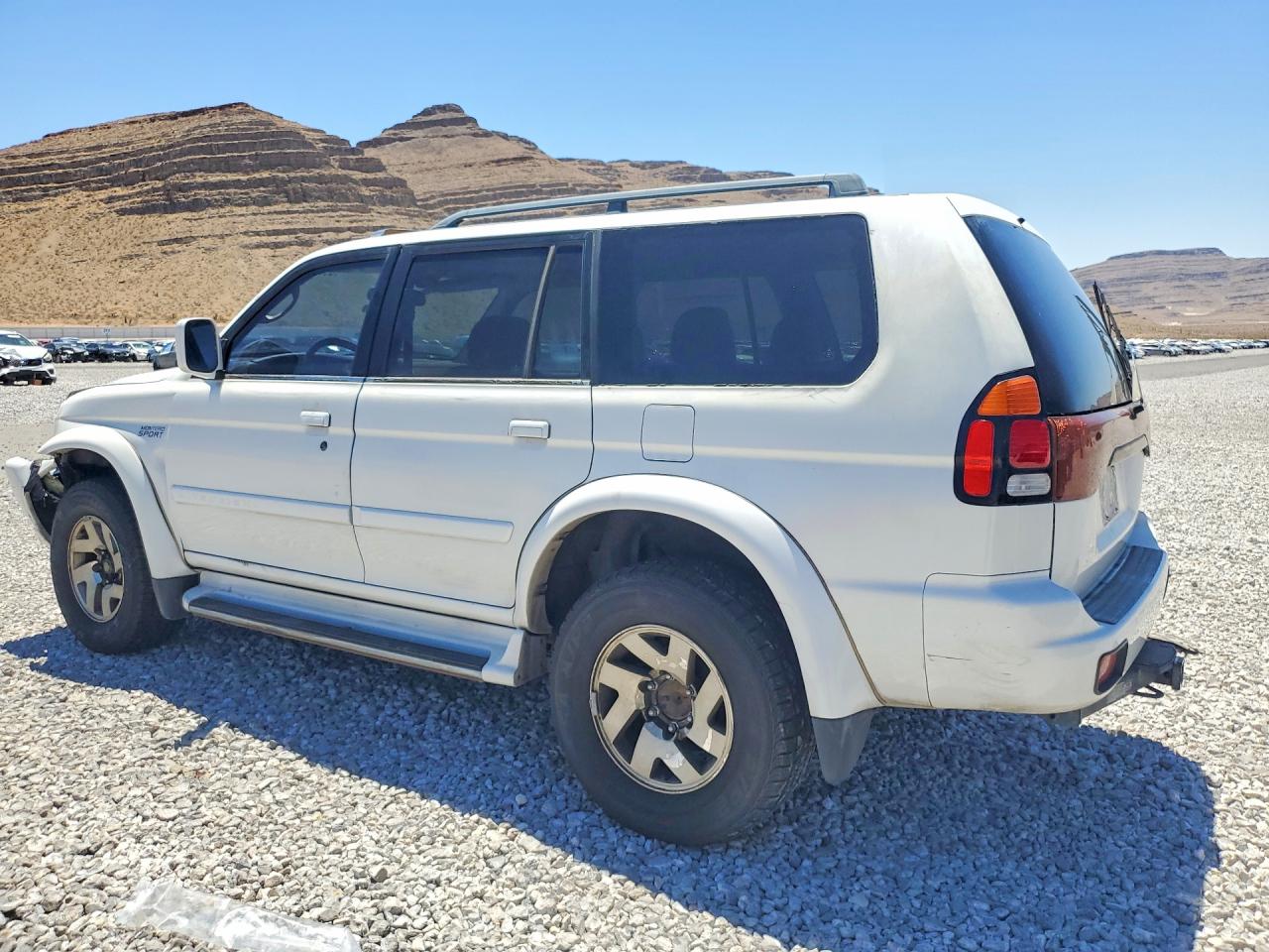 2001 Mitsubishi Montero Sport Limited Белый vin: JA4LS41R91P001727