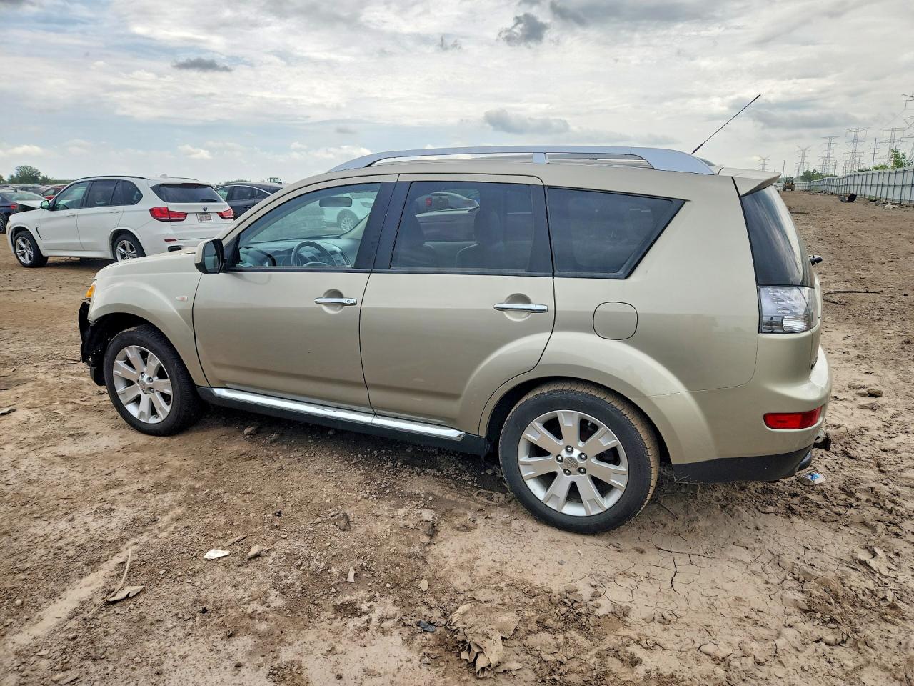 2009 Mitsubishi Outlander Se Cream vin: JA4LT31WX9Z010482