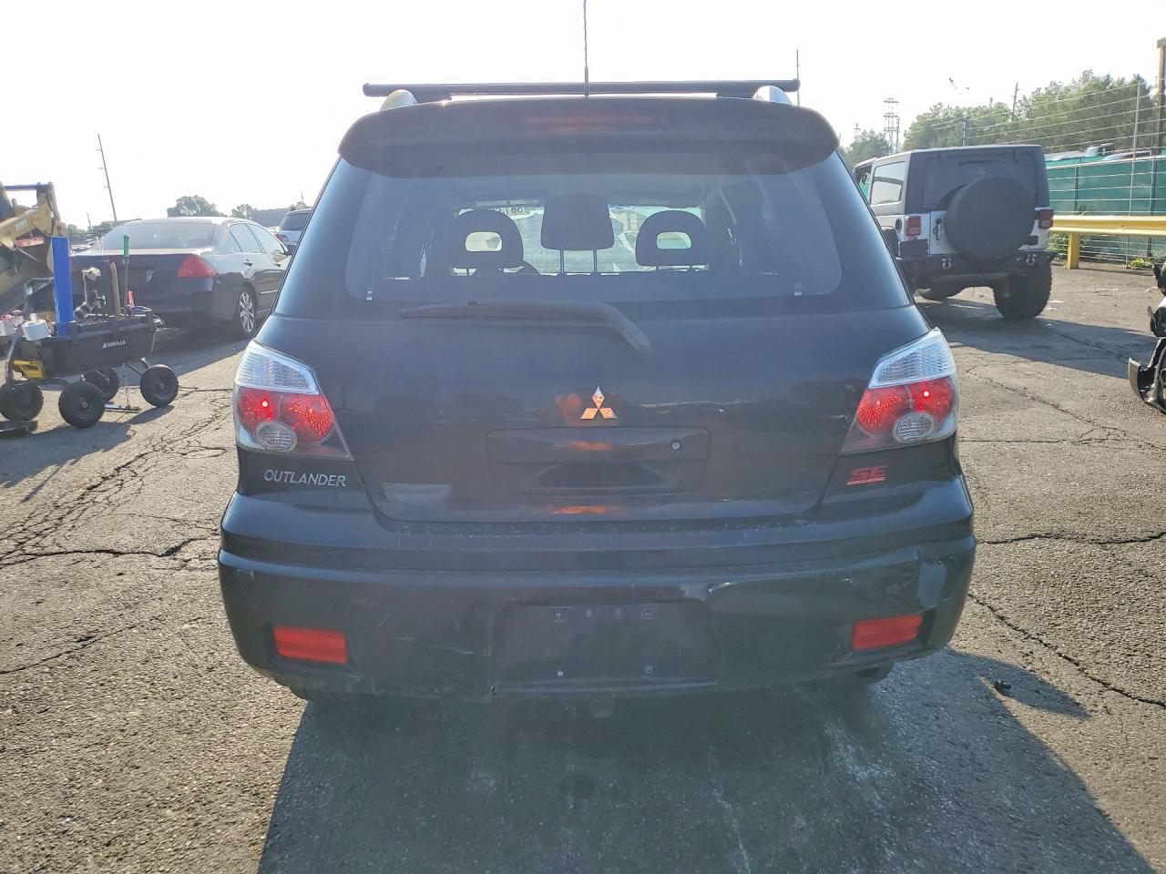 2006 Mitsubishi Outlander Black vin: JA4LX41FX6U034428