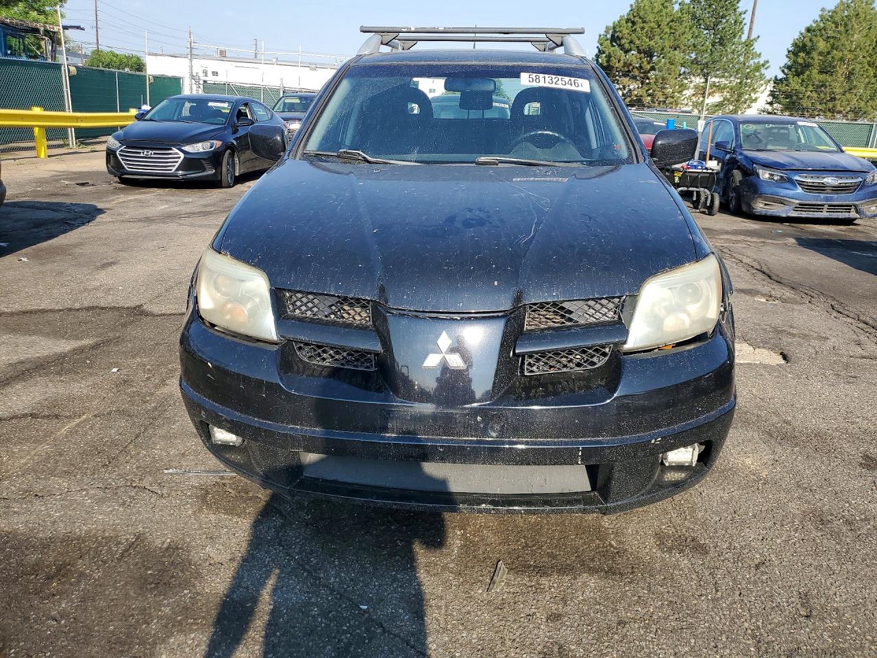 2006 Mitsubishi Outlander Black vin: JA4LX41FX6U034428