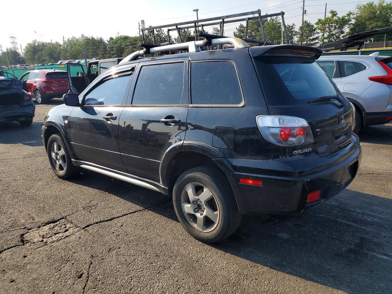 2006 Mitsubishi Outlander Black vin: JA4LX41FX6U034428