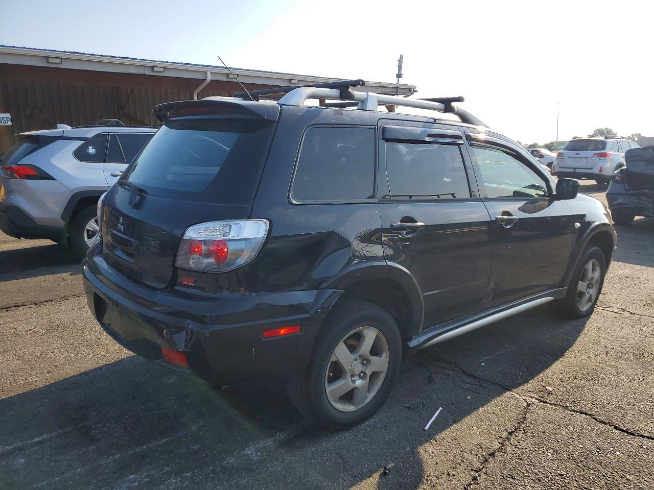 2006 Mitsubishi Outlander Black vin: JA4LX41FX6U034428