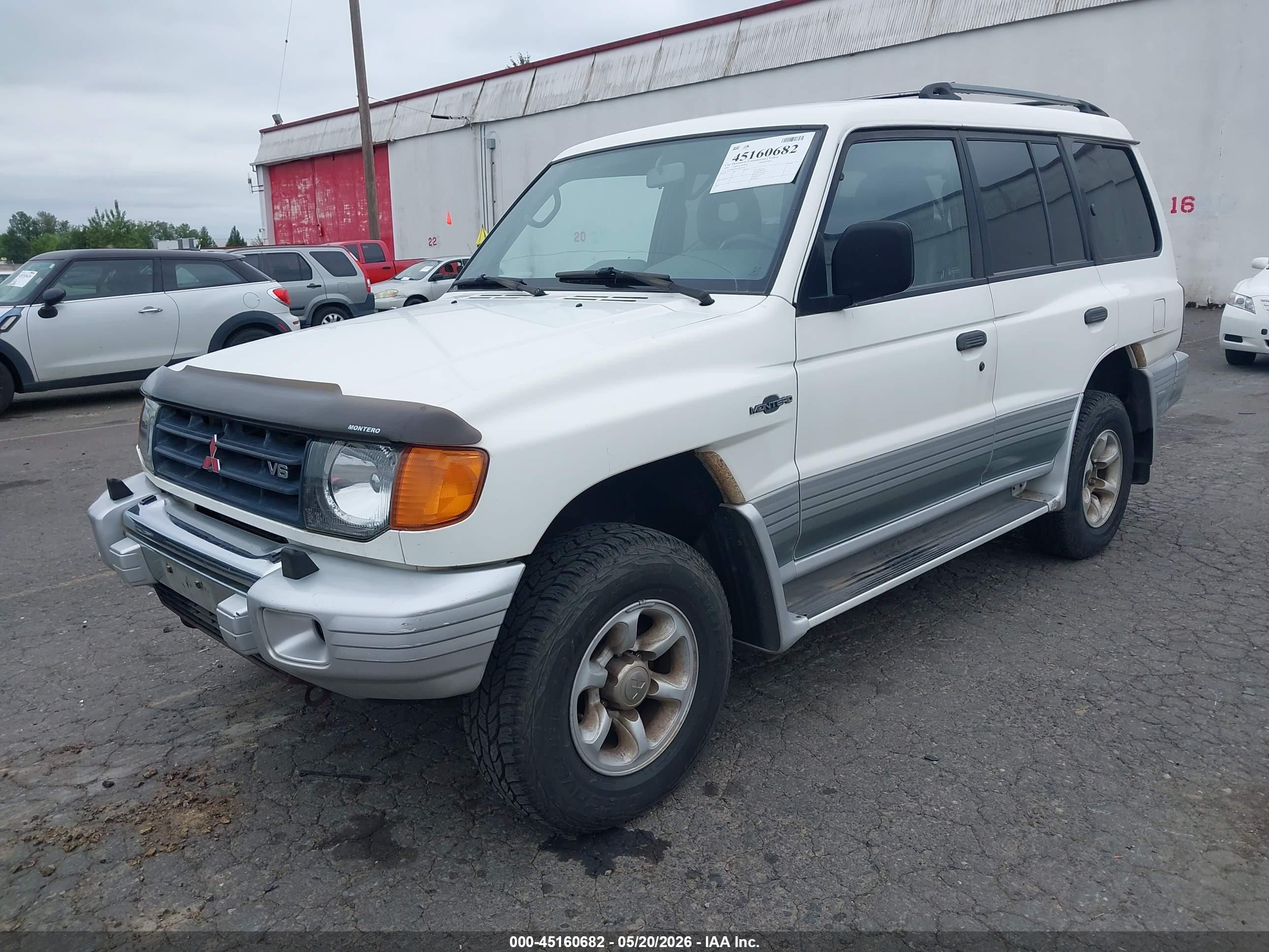 1998 Mitsubishi Montero   White vin: JA4MR51R5WJ001594