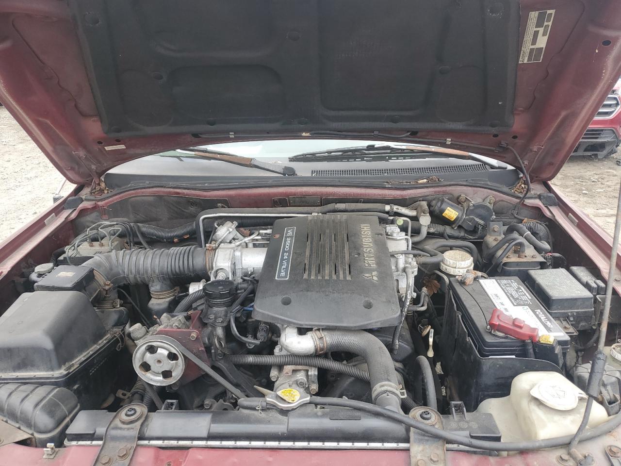 1999 Mitsubishi Montero Sport Limited Red vin: JA4MT41R1XP029063