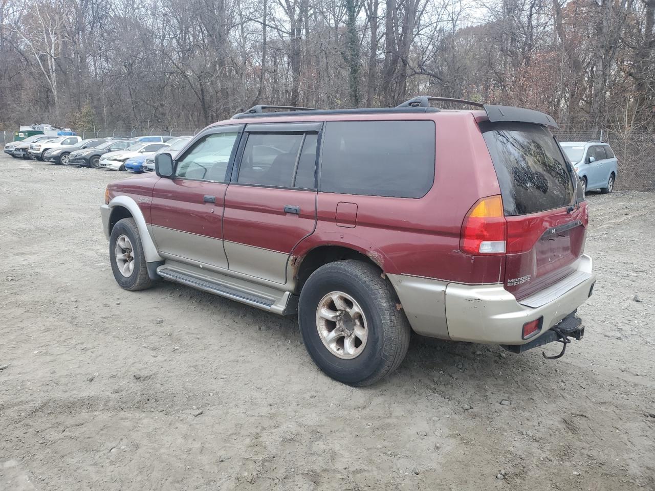 1999 Mitsubishi Montero Sport Limited Red vin: JA4MT41R1XP029063