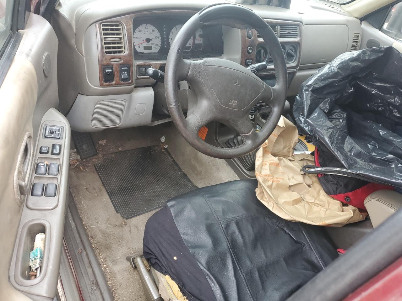 1999 Mitsubishi Montero Sport Limited Red vin: JA4MT41R1XP029063