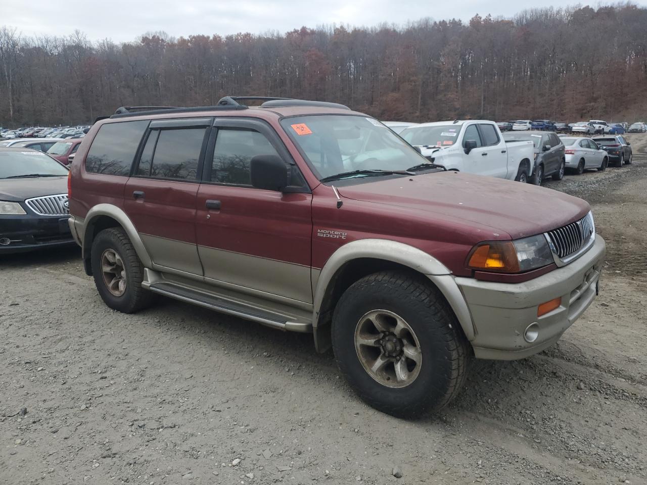 1999 Mitsubishi Montero Sport Limited Red vin: JA4MT41R1XP029063