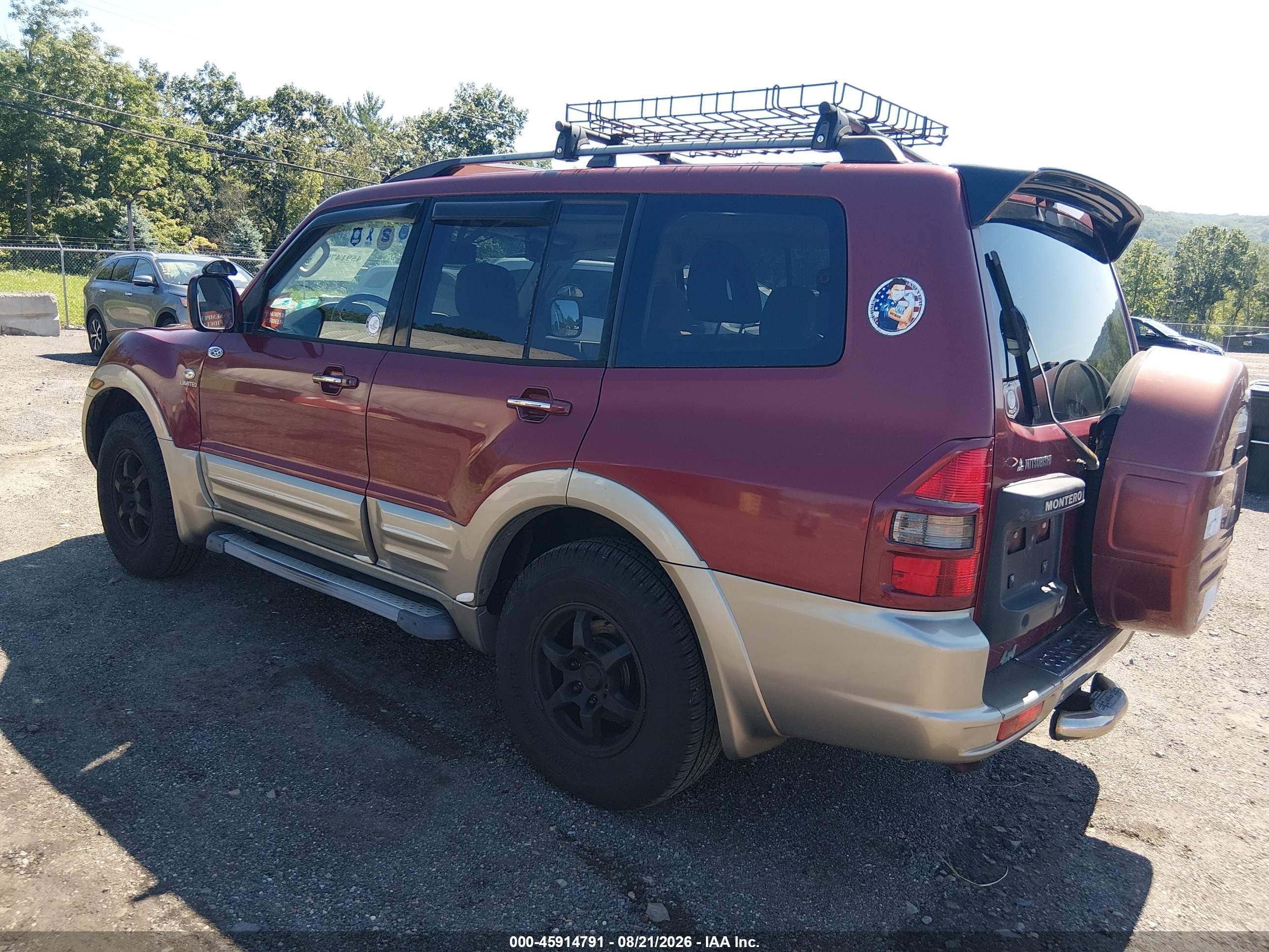 2002 Mitsubishi Montero Limited Red vin: JA4MW51R02J018029