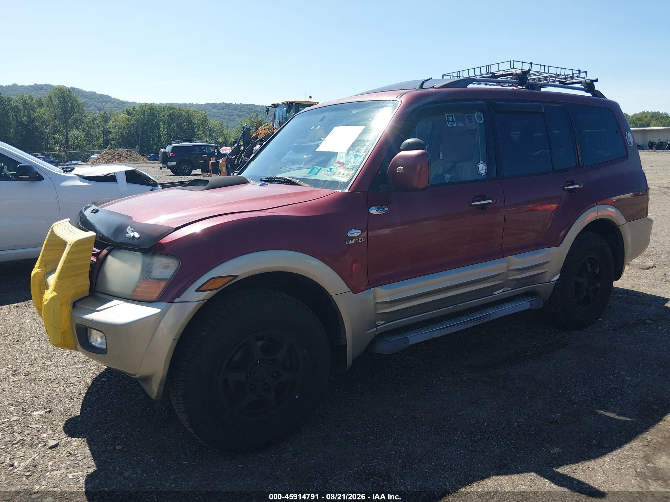 2002 Mitsubishi Montero Limited Red vin: JA4MW51R02J018029