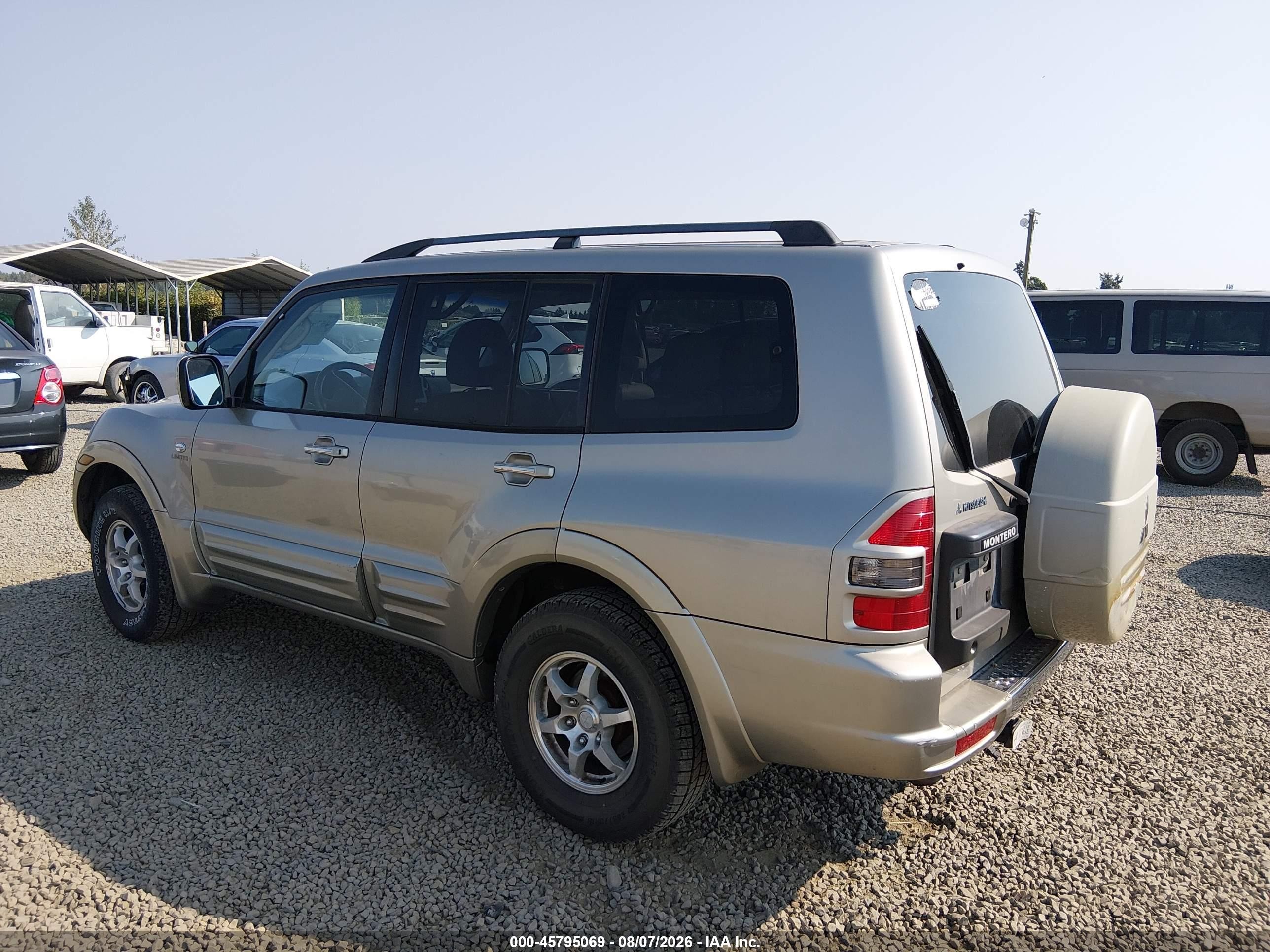 2002 Mitsubishi Montero Limited Золотой vin: JA4MW51R52J023601